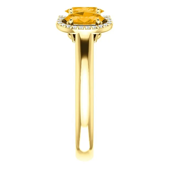 14KT GOLD 1.32 CTW CITRINE & 0.10 CTW DIAMOND 3 STONE OVAL HALO RING