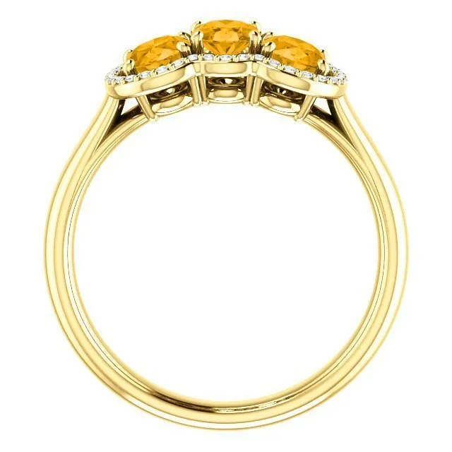 14KT GOLD 1.32 CTW CITRINE & 0.10 CTW DIAMOND 3 STONE OVAL HALO RING