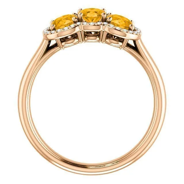 14KT GOLD 1.32 CTW CITRINE & 0.10 CTW DIAMOND 3 STONE OVAL HALO RING