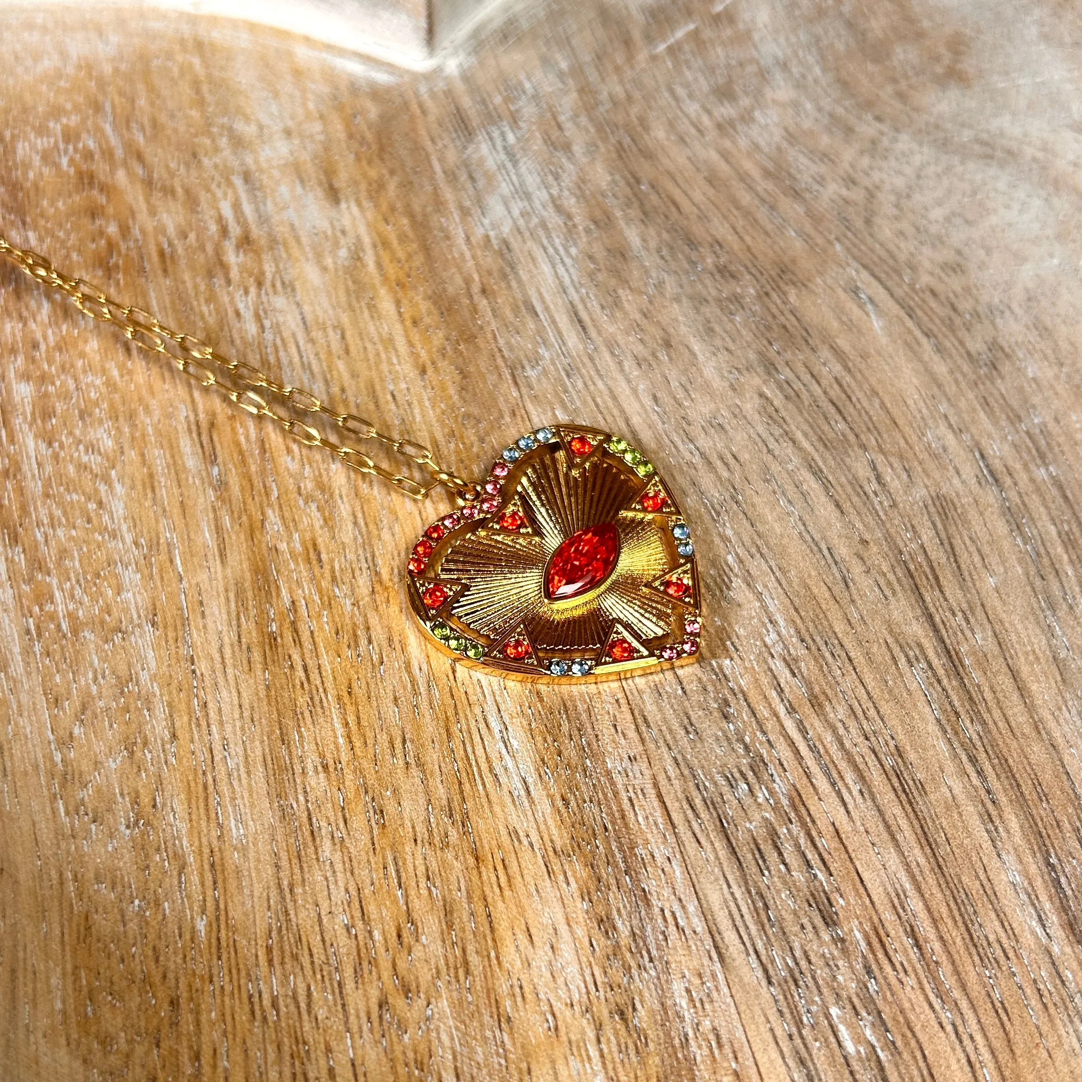 BELLA long chain necklace with blood orange crystal heart and eye pendant