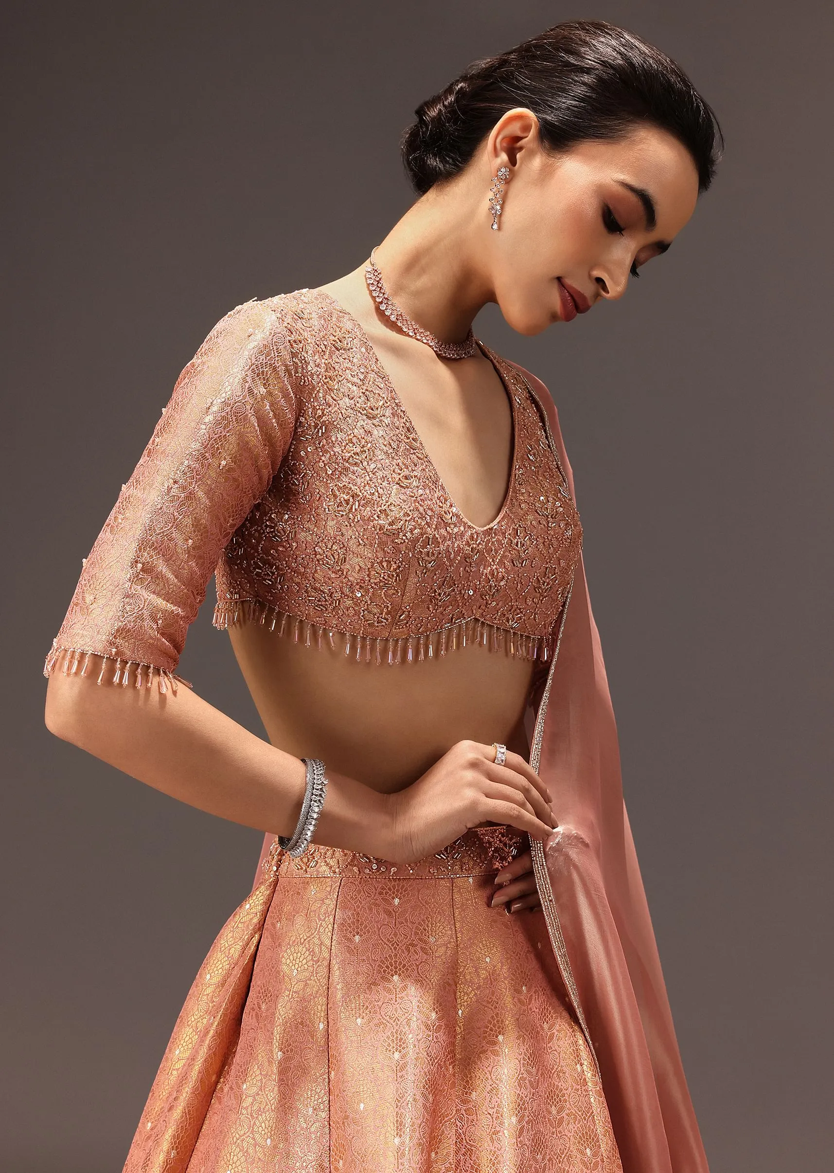 Dusty Peach Banarasi Silk Hand Work Lehenga Set