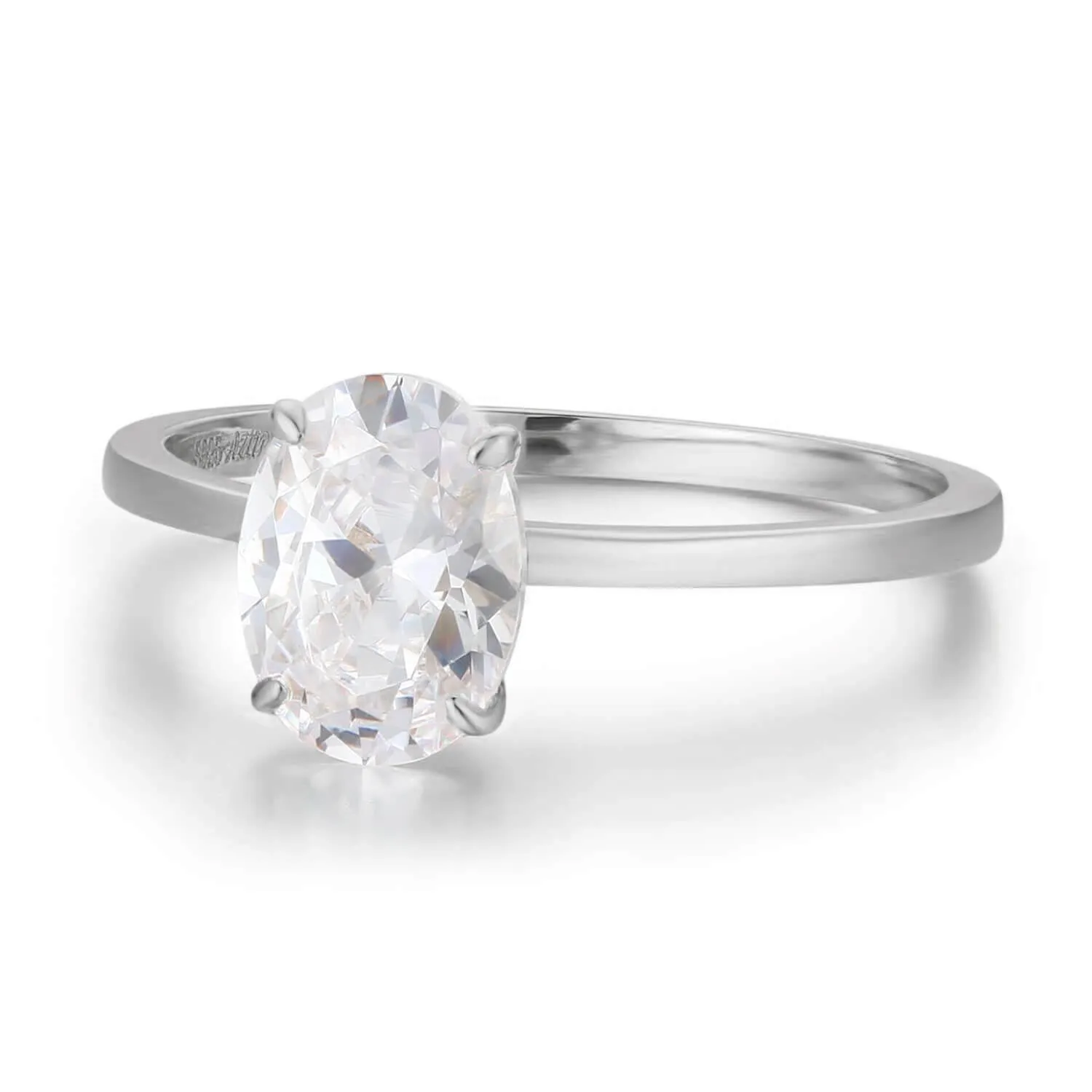 Hidden Ruby Heart Oval Moissanite Ring