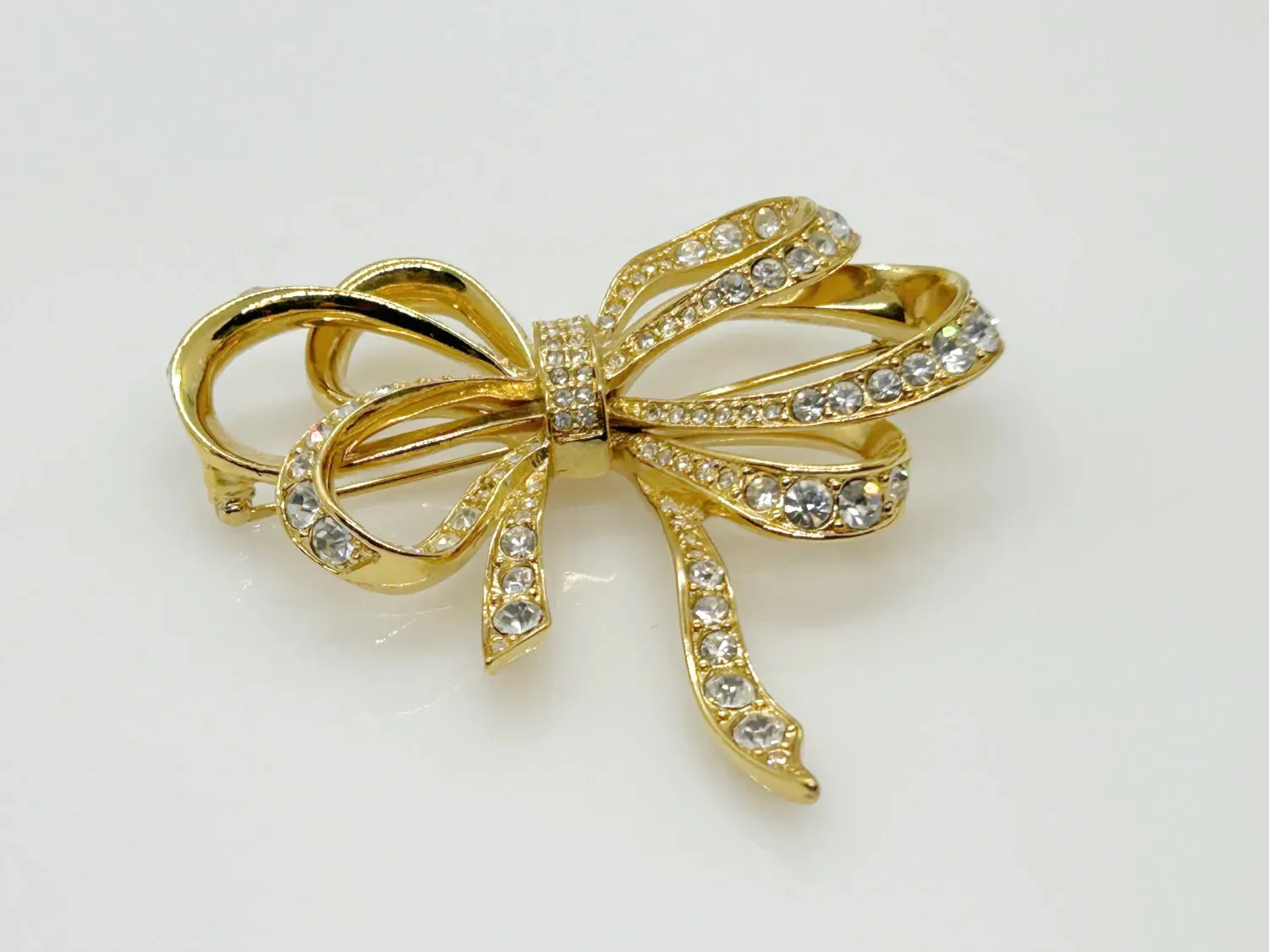 Vintage Flowing Rhinestone Ribbon Bow Brooch by Kenneth Jay Lane for Avon